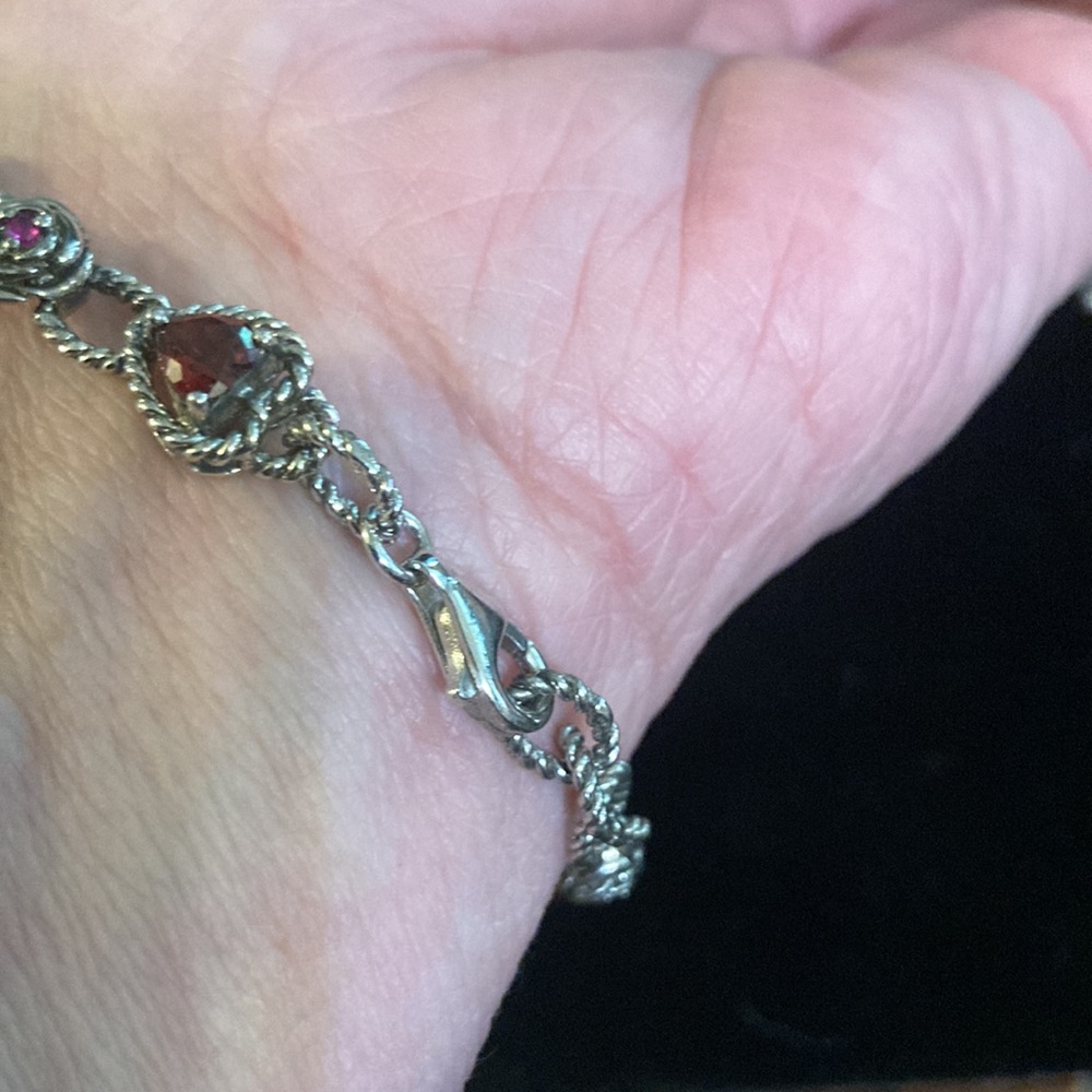 Gorgeous Sterling silver bracelet surrounded by lab created rubies and garnets - Picture 5 of 7